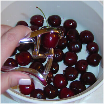 squeezing cherries photo
